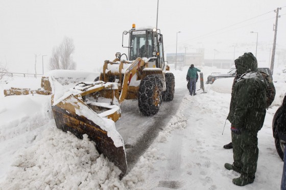 A snow plough opens the road during a heavy snowstorm in Mdeirej area, eastern Lebanon